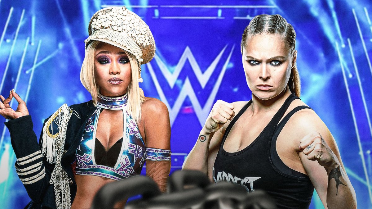 Alicia Fox next to Ronda Rousey with the WWE logo as the background.