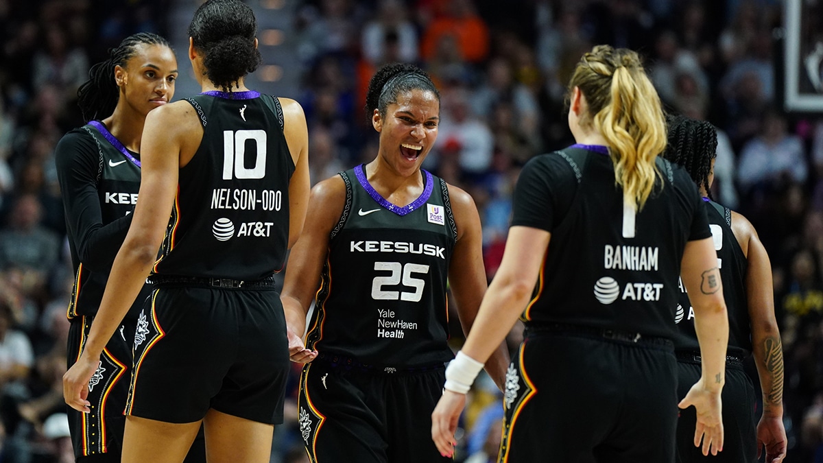 Connecticut Sun forward Alyssa Thomas (25) and teammates react after a play against the Indiana Fever in the second half.