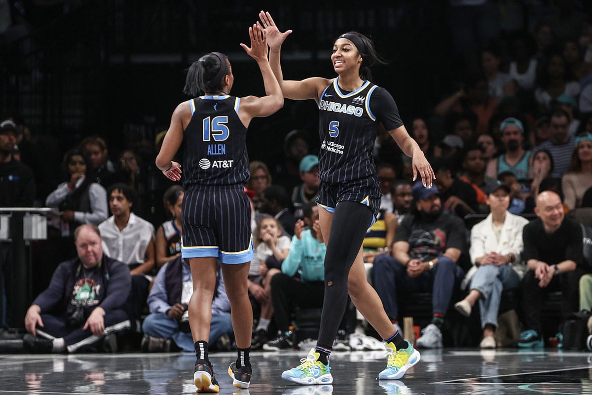 Chicago Sky forward Angel Reese (5) celebrates with guard Lindsay Allen (15) in the fourth quarter against the New York Liberty.