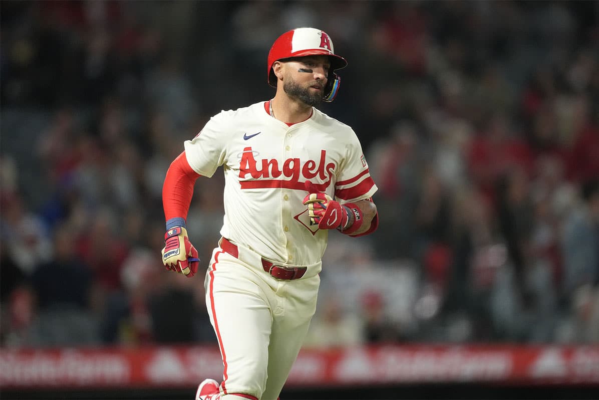 Los Angeles Angels center fielder Kevin Pillar (12) runs to first after hitting a RBI single in the seventh inning against the St. Louis Cardinals at Angel Stadium.