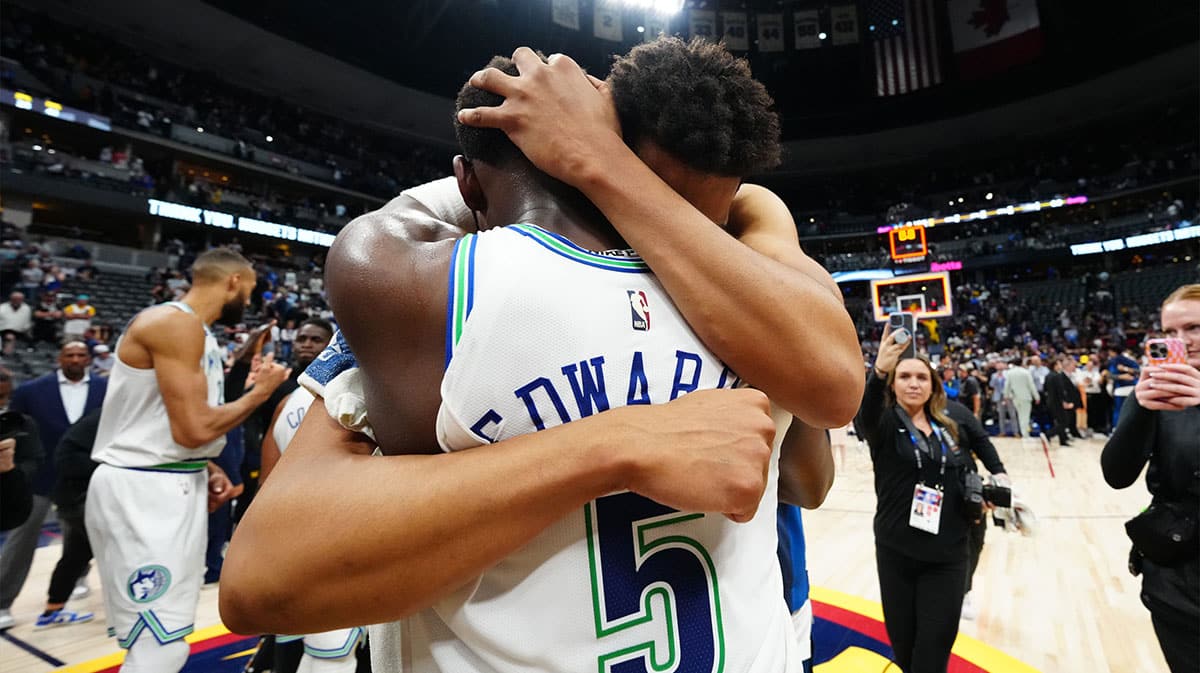 Anthony Edwards and Karl Anthony Towns celebrating after advancing to the Western Conference Finals