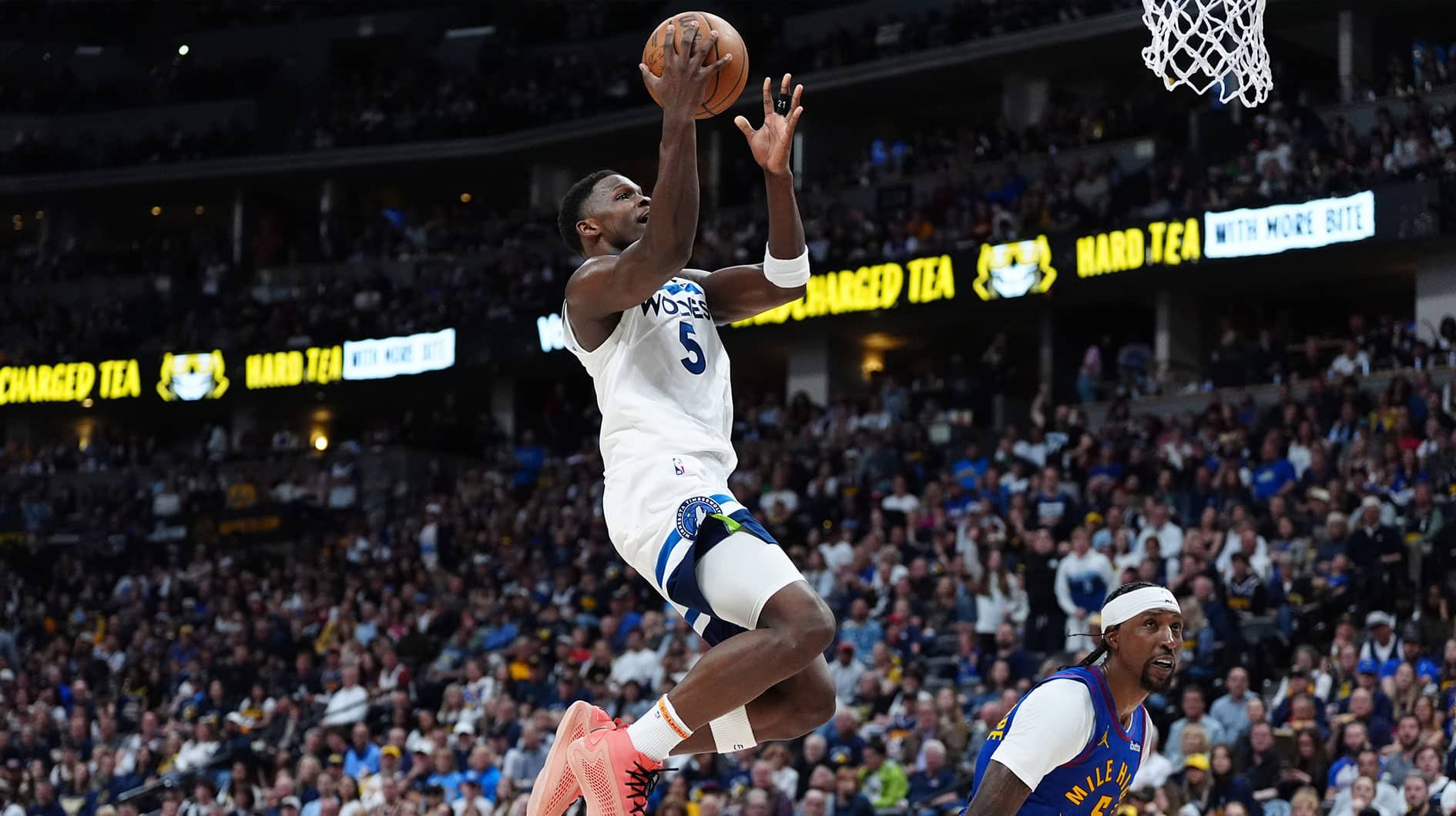 Minnesota Timberwolves guard Anthony Edwards (5) shoots over Denver Nuggets guard Kentavious Caldwell-Pope (5) in the second quarter during game one of the second round for the 2024 NBA playoffs at Ball Arena