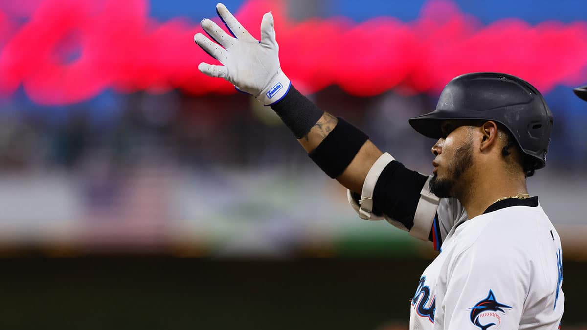 Miami Marlins second baseman Luis Arraez (3) reacts after hitting RBI single against the Colorado Rockies during the fifth inning at loanDepot Park