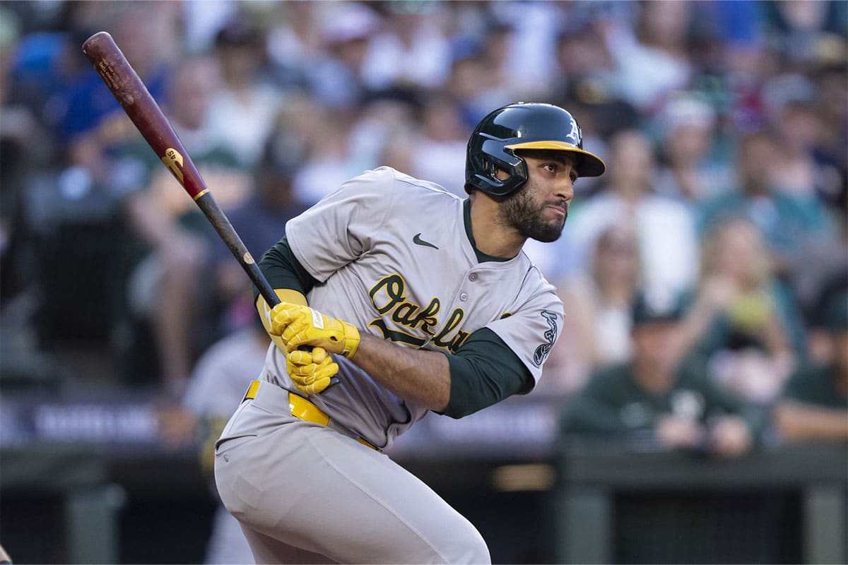 Oakland Athletics second baseman Abraham Toro (31) hits a RBI-single during the third inning against the Seattle Mariners at T-Mobile Park.