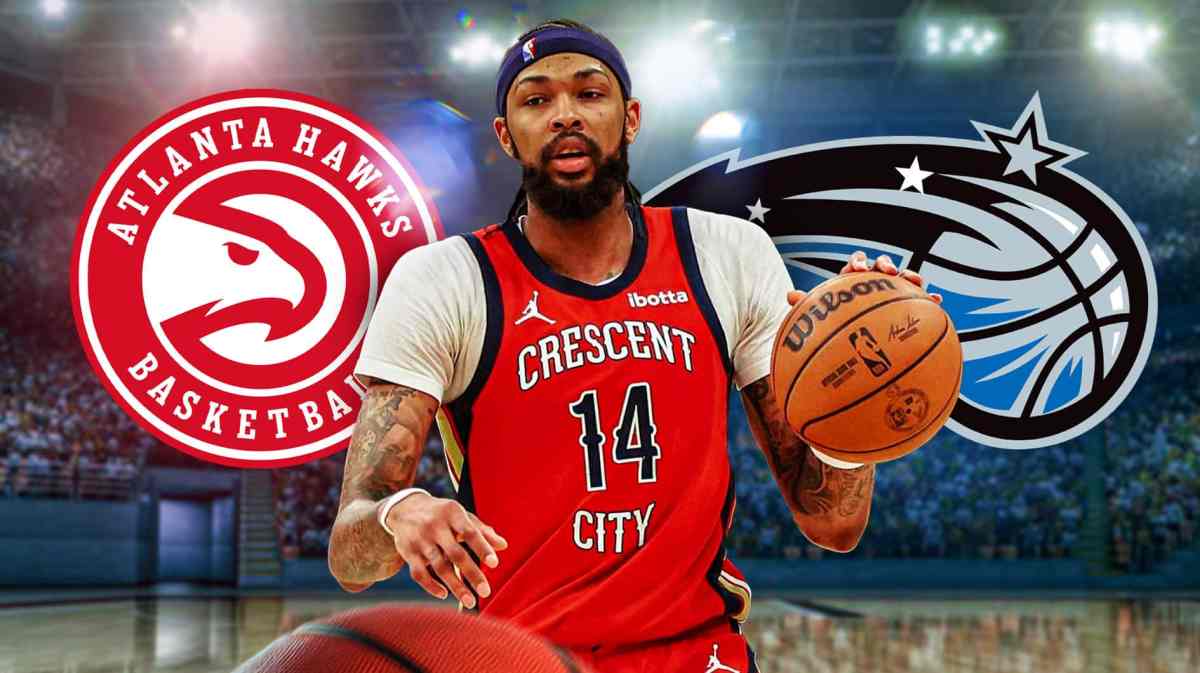 Pelicans forward Brandon Ingram looks at trade reporters beside Magic, Hawks logos