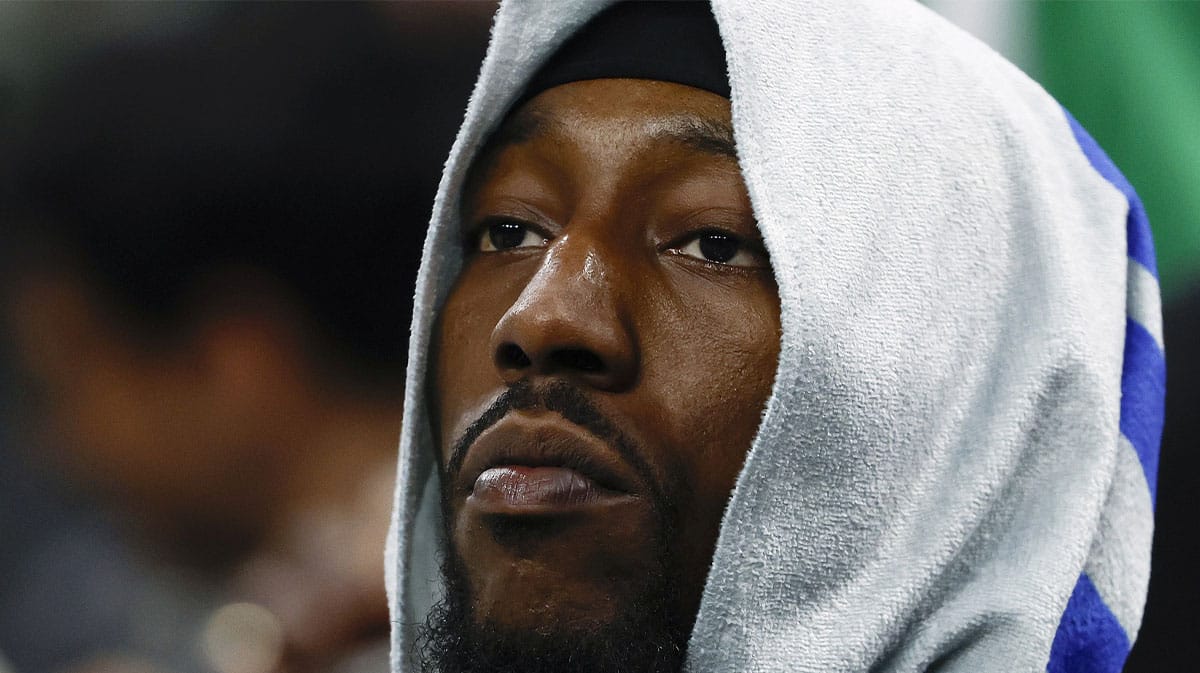  Miami Heat center Bam Adebayo (13) looks on from the bench during the fourth quarter of their 118-84 loss to the Boston Celtics in game five of the first round of the 2024 NBA playoffs at TD Garden.