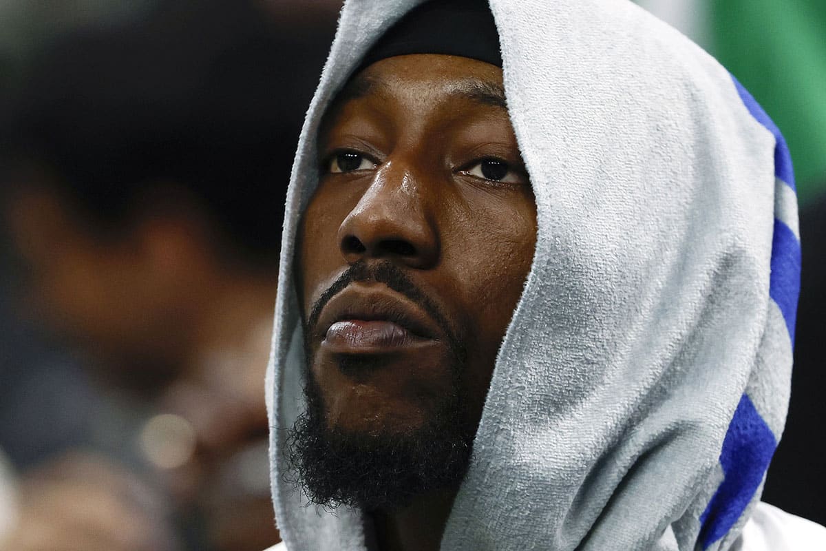 Miami Heat center Bam Adebayo (13) looks on from the bench during the fourth quarter of their 118-84 loss to the Boston Celtics in game five of the first round of the 2024 NBA playoffs at TD Garden.