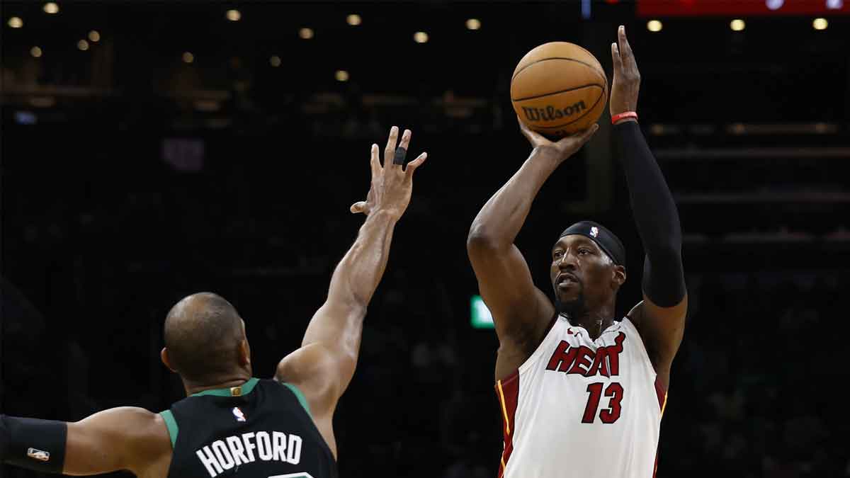 Miami Heat center Bam Adebayo (13) shoots against Boston Celtics center Al Horford (42) during the first quarter of game five of the first round of the 2024 NBA playoffs at TD Garden.