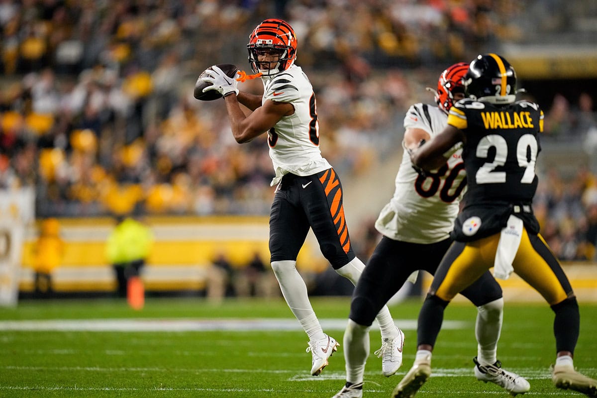 Cincinnati Bengals wide receiver Tyler Boyd (83) catches a pass in the first quarter of the NFL 16 game between the Pittsburgh Steelers and the Cincinnati Bengals at Acrisure Stadium in Pittsburgh on Saturday, Dec. 23, 2023.