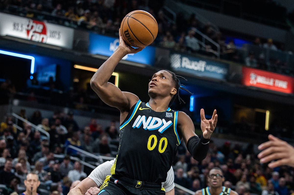 Indiana Pacers guard Bennedict Mathurin (00) shoots the ball in the second half against the New Orleans Pelicans at Gainbridge Fieldhouse.