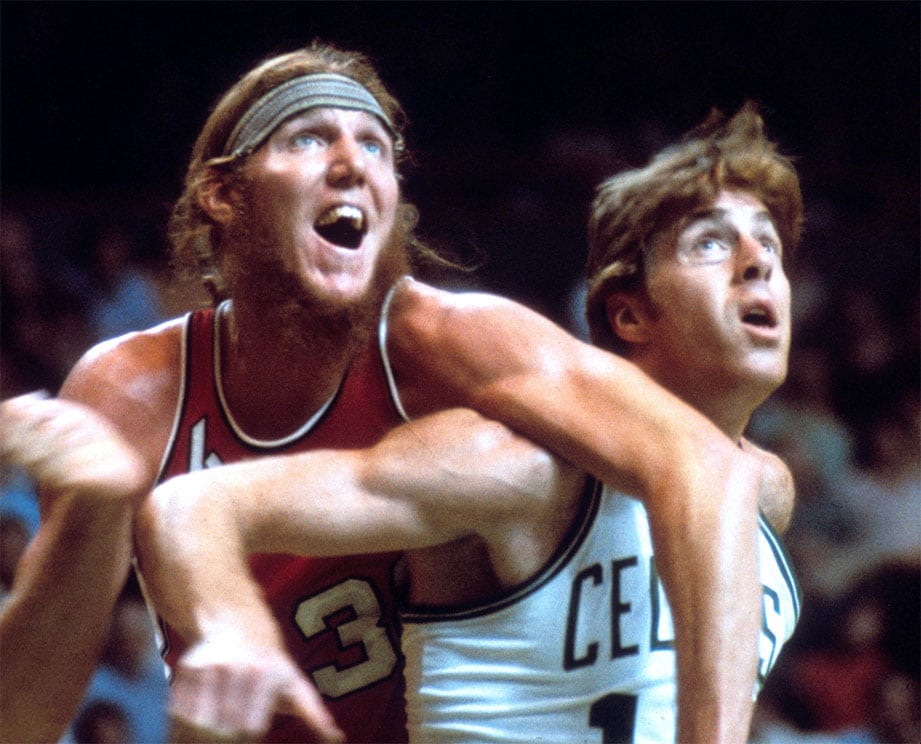 Portland Trailbazers center Bill Walton (left) battles for position with Boston Celtics center Dave Cowens (right) at Boston Garden.