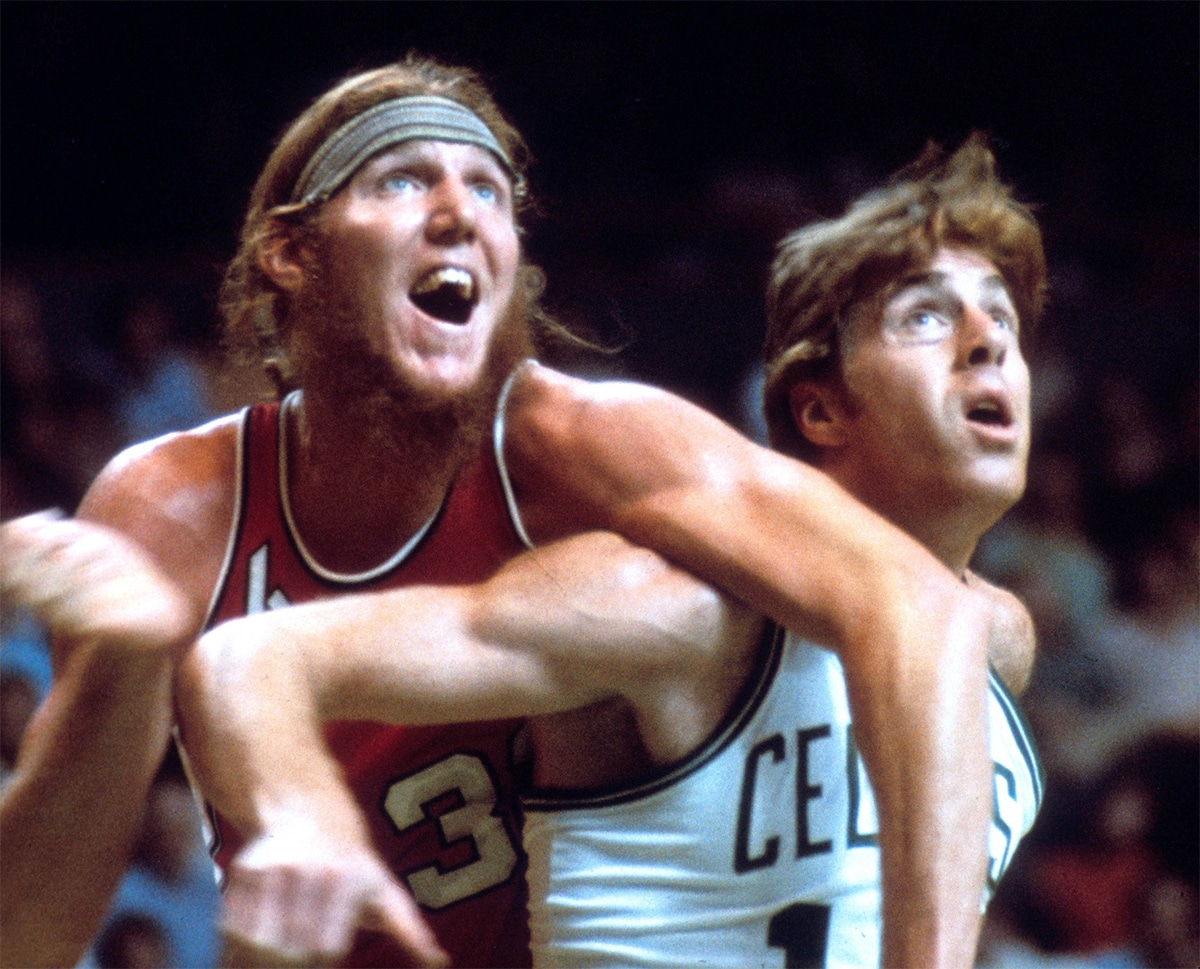 Portland Trail Bazers center Bill Walton (left) battles for position with Boston Celtics center Dave Cowens (right) at Boston Garden. 