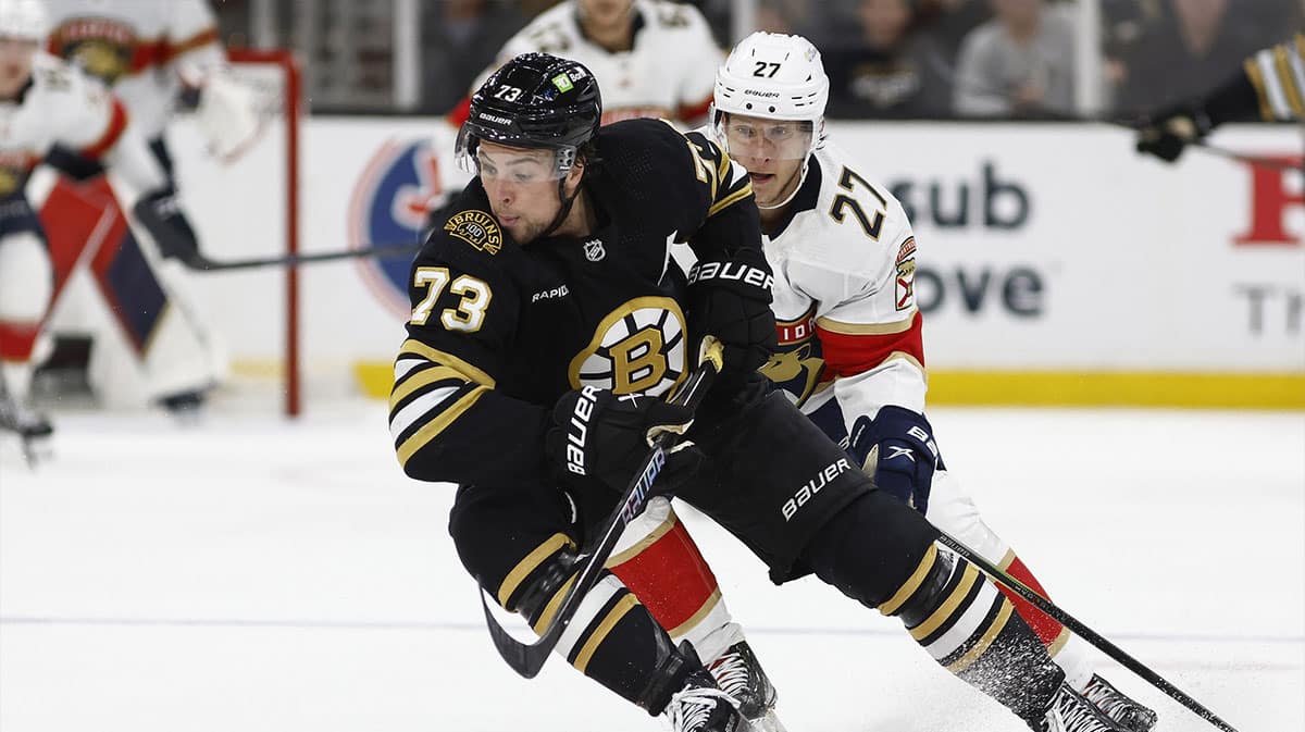 Boston Bruins defenseman Charlie McAvoy (73) cuts away from Florida Panthers center Eetu Luostarinen (27) during the third period of game three of the second round of the 2024 Stanley Cup Playoffs at TD Garden.