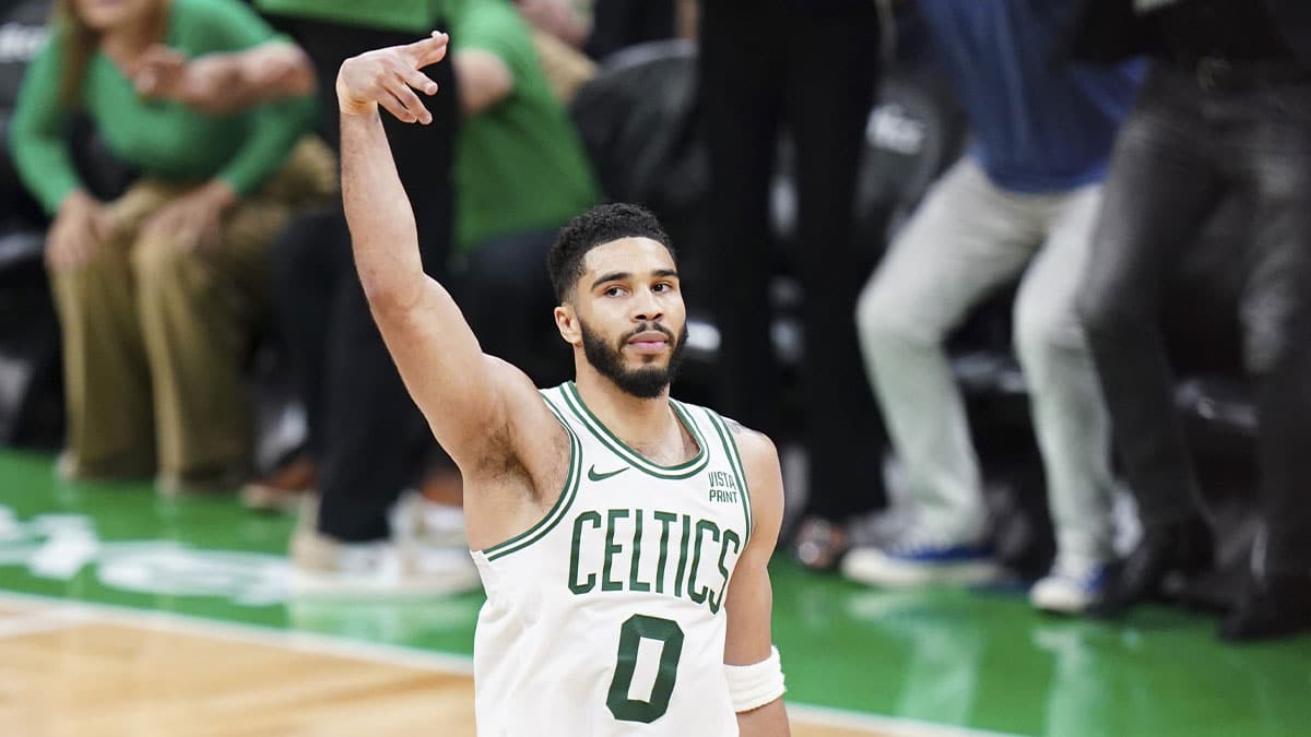 May 21, 2024; Boston, Massachusetts, USA; Boston Celtics forward Jayson Tatum (0) reacts after his three point basket against the Indiana Pacers in over-time during game one of the eastern conference finals for the 2024 NBA playoffs at TD Garden. Mandatory Credit: David Butler II-USA TODAY Sports