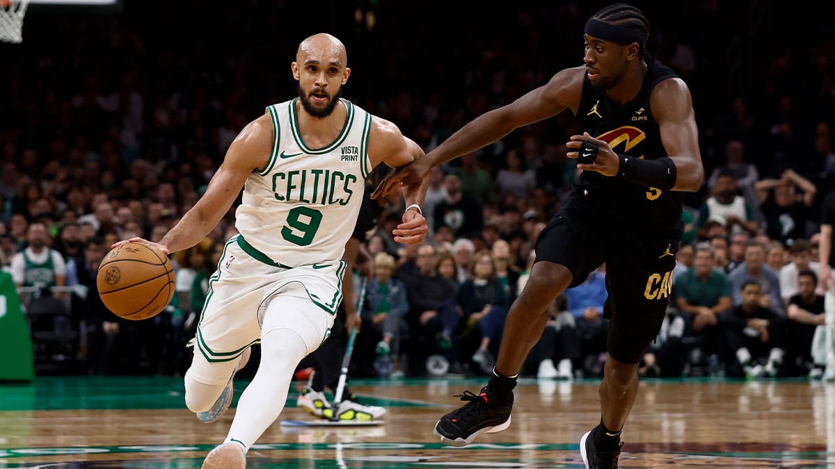May 7, 2024; Boston, Massachusetts, USA; Boston Celtics guard Derrick White (9) drives on Cleveland Cavaliers guard Caris LeVert (3) during the third quarter of game one of the second round of the 2024 NBA playoffs at TD Garden. Mandatory Credit: Winslow Townson-USA TODAY Sports