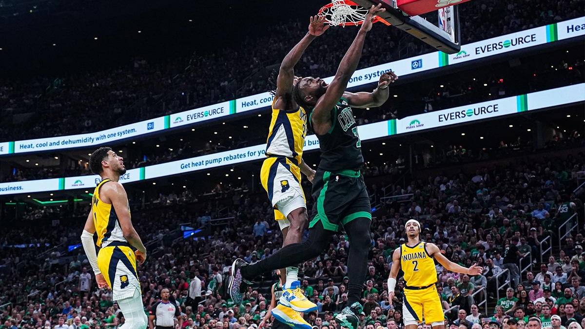 May 23, 2024; Boston, Massachusetts, USA; Boston Celtics guard Jaylen Brown (7) drives to the basket against Indiana Pacers forward Isaiah Jackson (22) in the first half during game two of the eastern conference finals for the 2024 NBA playoffs at TD Garden. Mandatory Credit: David Butler II-USA TODAY Sports