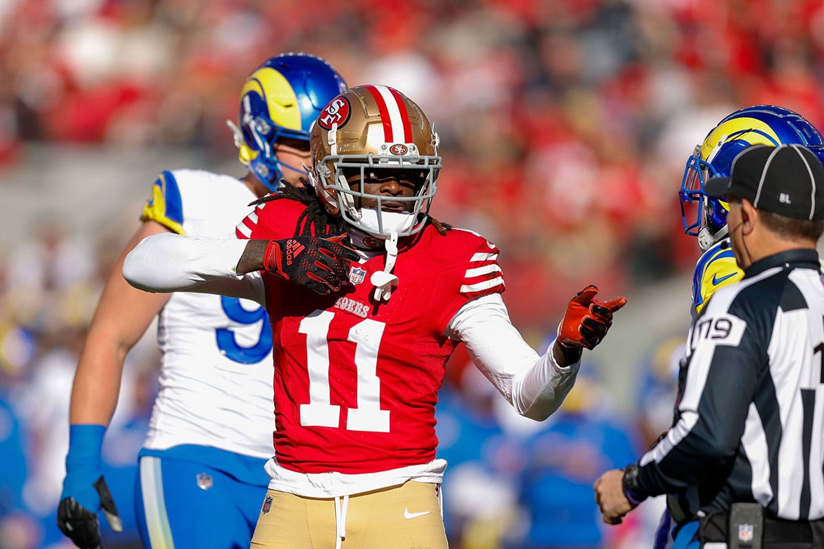 San Francisco 49ers wide receiver Brandon Aiyuk (11) celebrates after a play against the Los Angeles Rams during the first quarter at Levi's Stadium.