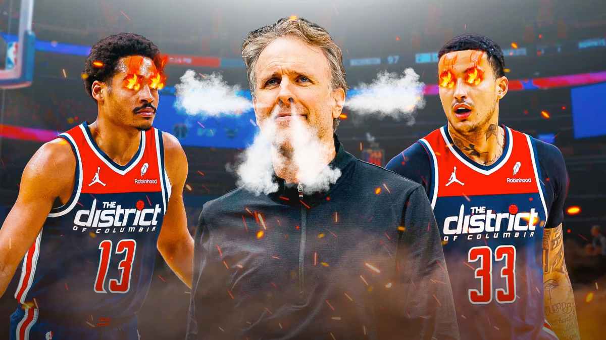 Wizards' Brian Keefe next to Jordan Poole and Kyle Kuzma