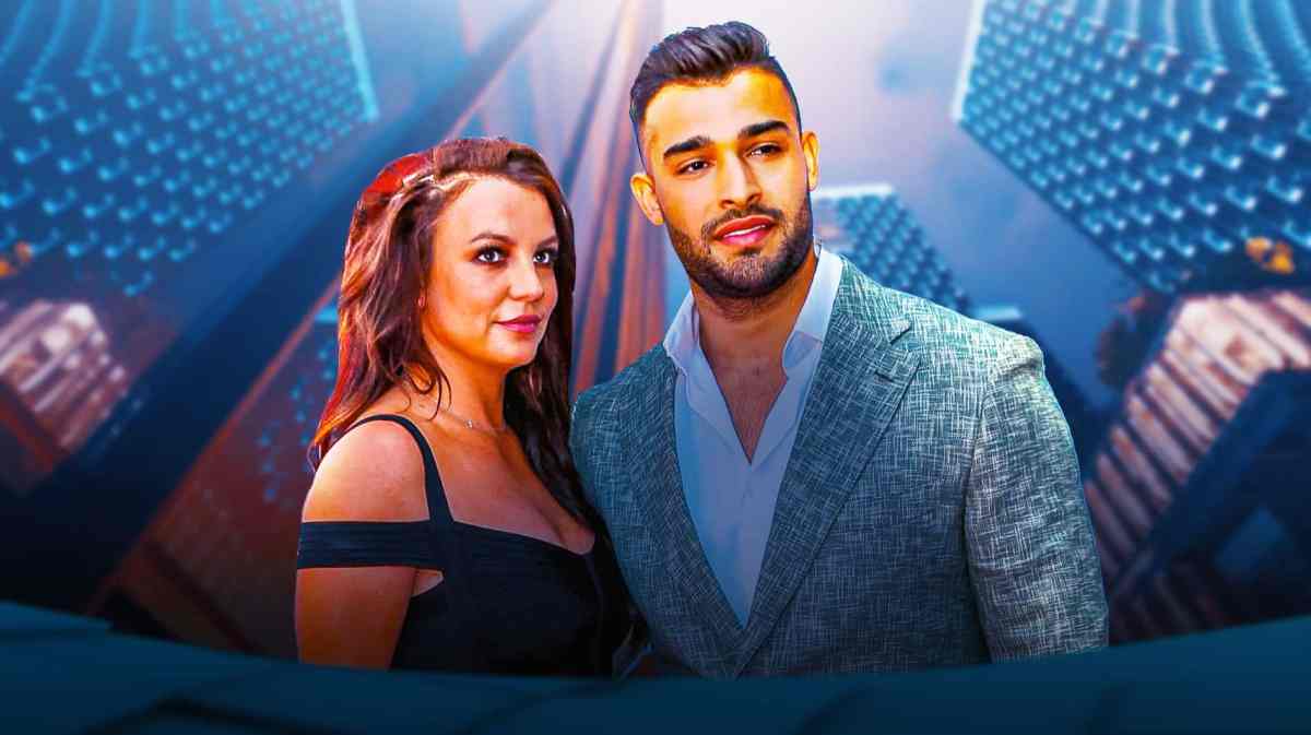 Britney Spears and Sam Asghari with a building behind them
