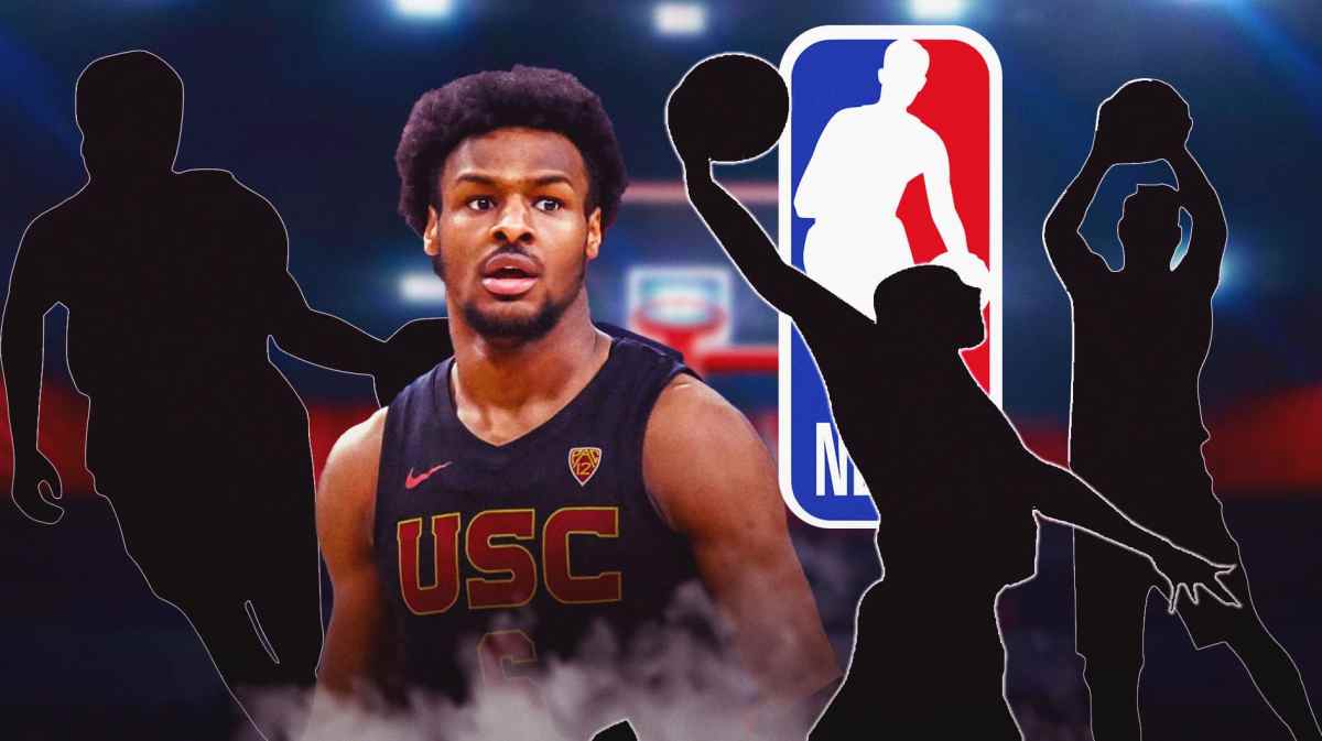 Bronny James stands next to Jrue Holiday, Derrick White, Lakers' LeBron James in shadow