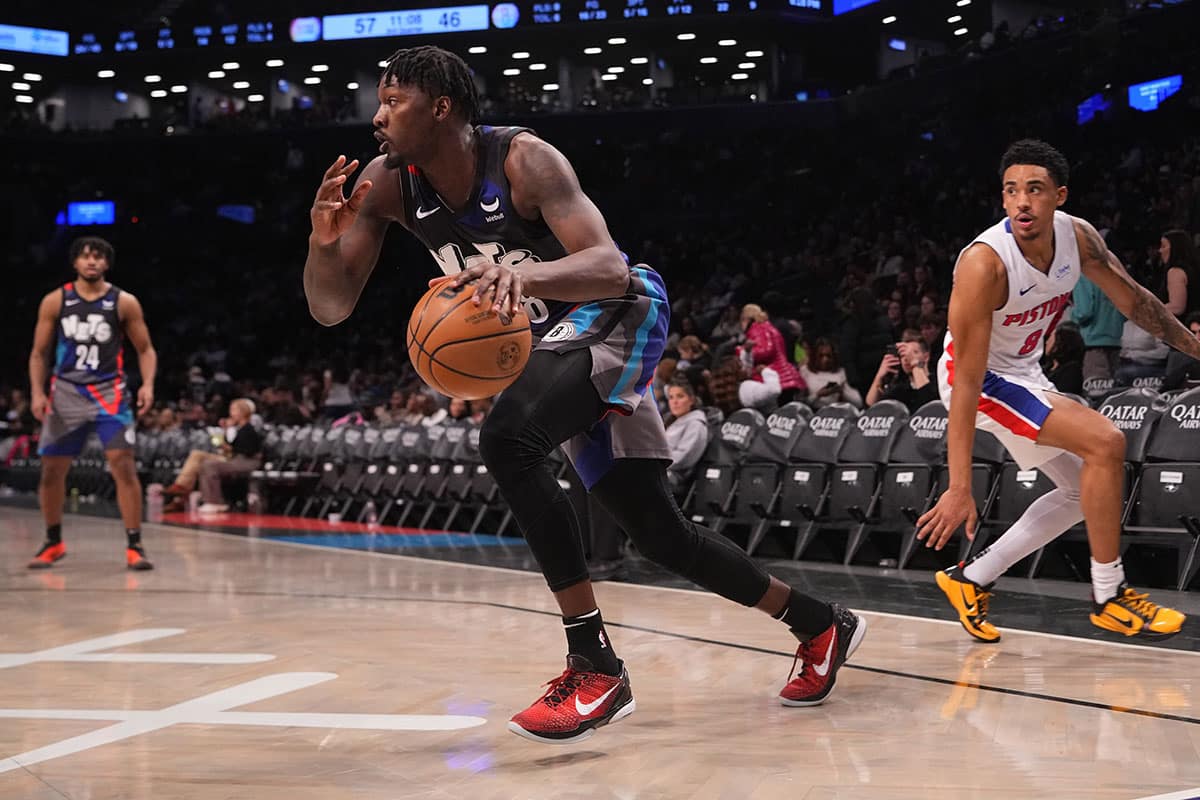 Apr 6, 2024; Brooklyn, New York, USA; Brooklyn Nets power forward Dorian Finney-Smith (28) dribbles the ball against the Detroit Pistons during the second half at Barclays Center. 