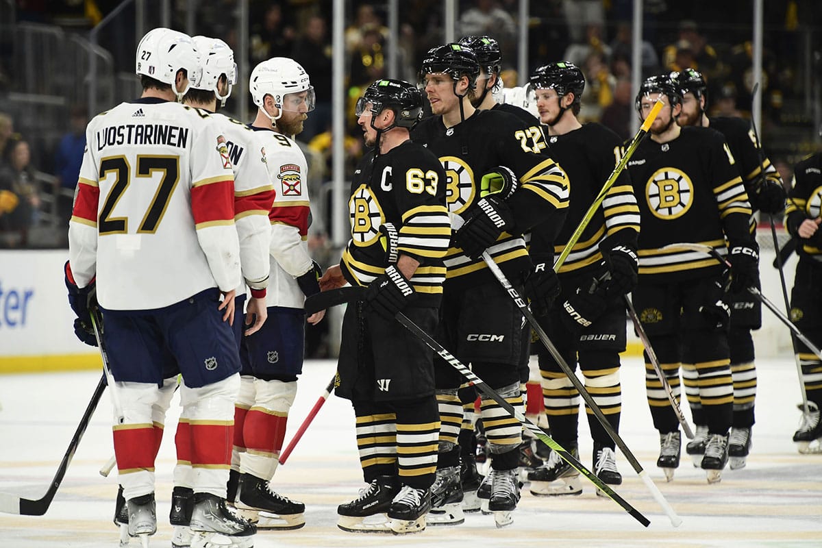 Florida Panthers center Sam Bennett (9) and Boston Bruins left wing Brad Marchand (63) speak after the Panthers defeated the Bruins in game six of the second round of the 2024 Stanley Cup Playoffs at TD Garden.