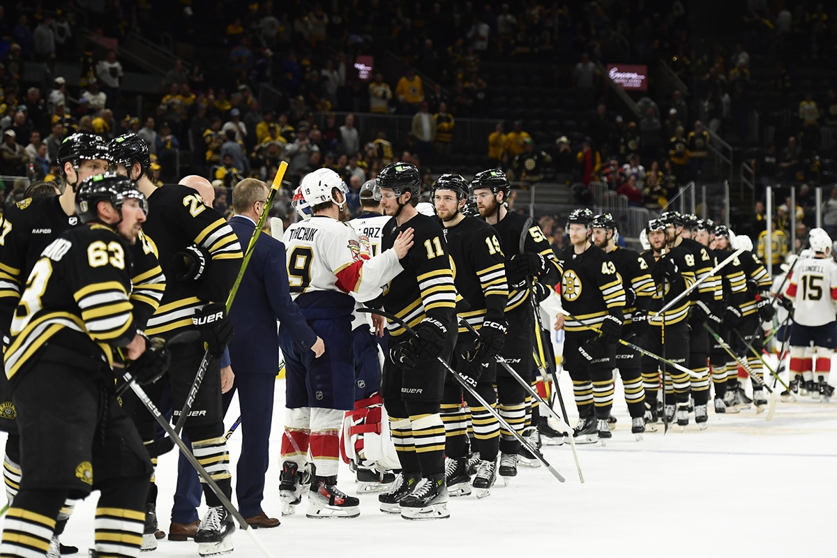 Florida Panthers left wing Matthew Tkachuk (19) and Boston Bruins center Trent Frederic (11) shake hands after the Panthers defeated the Bruins in game six of the second round of the 2024 Stanley Cup Playoffs at TD Garden.