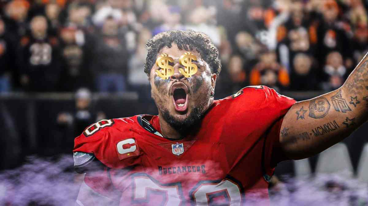 Tristan Wirfs with dollar signs on his eyes