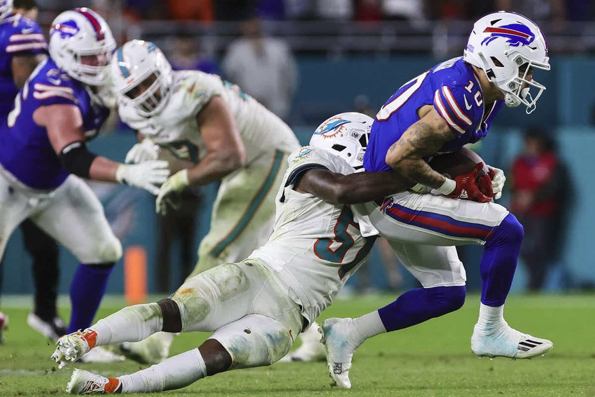 Buffalo Bills wide receiver Khalil Shakir (10) runs with the football against Miami Dolphins linebacker David Long Jr. (51) during the fourth quarter at Hard Rock Stadium. 