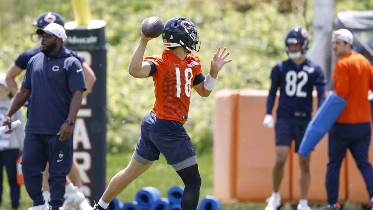 Chicago Bears quarterback Caleb Williams (18) throws the ball during organized team activities at Halas Hall 