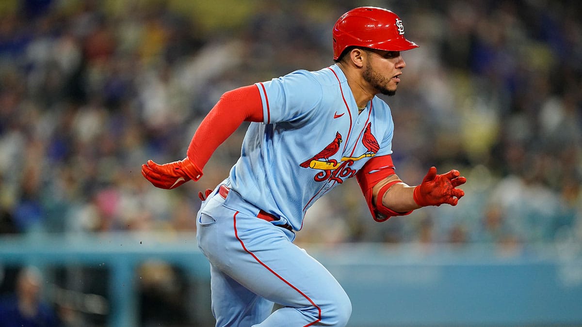 St. Louis Cardinals catcher Wilson Contreras (40) runs after hitting a single against the Los Angeles Dodgers during the ninth inning at Dodger Stadium.
