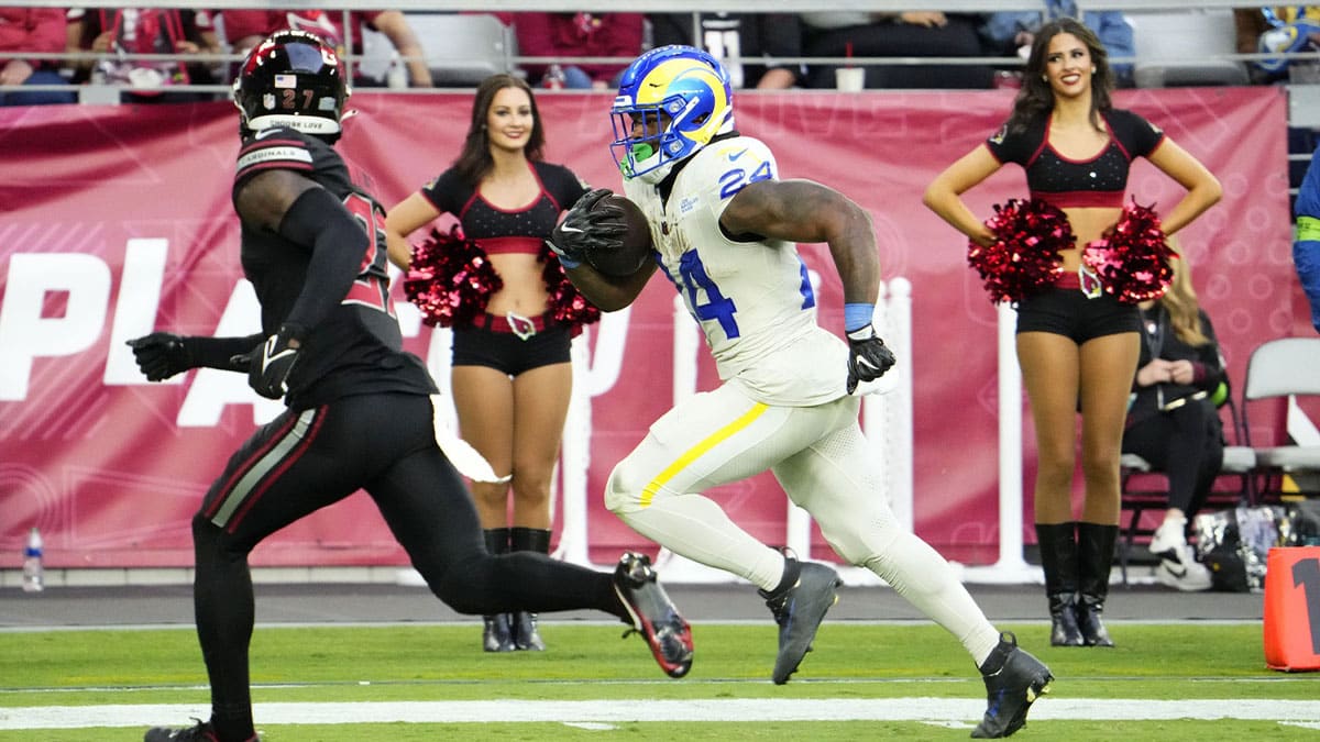 Los Angeles Rams running back Royce Freeman (24) runs for a touchdown against the Arizona Cardinals in the second half at State Farm Stadium