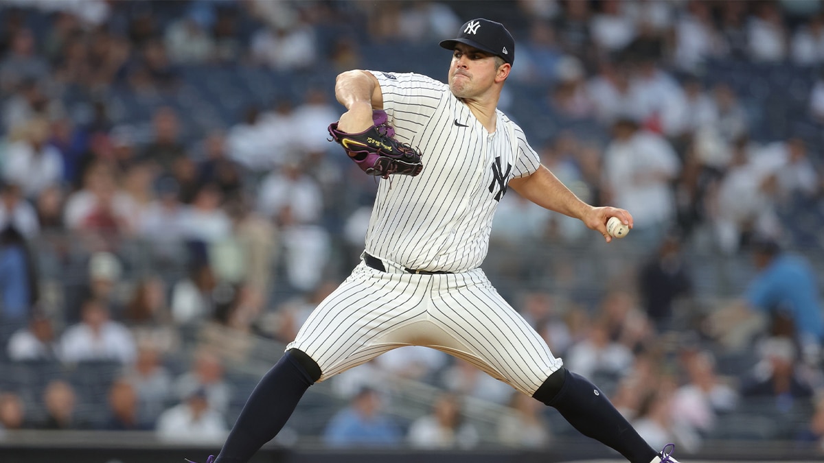 New York Yankees starting pitcher Carlos Rodon (55) pitches against the Houston Astros during the third inning at Yankee Stadium
