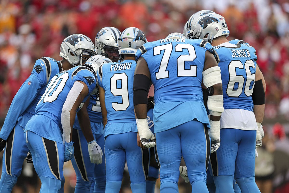Carolina Panthers quarterback Bryce Young (9) leads a huddle against the Tampa Bay Buccaneers in the first quarter at Raymond James Stadium