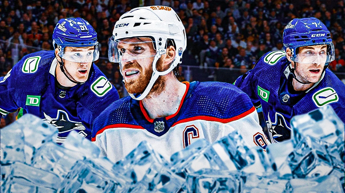 Carson Soucy and Nikita Zadorov on either side looking stern, Connor McDavid in middle looking stern, hockey rink in background