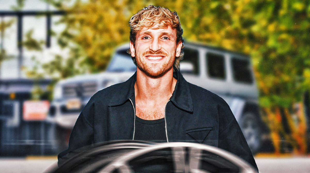 Logan Paul in front of a car from his collection.