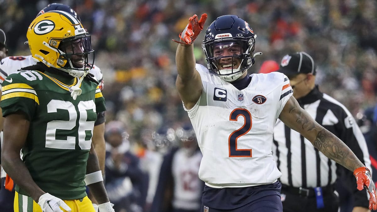 Chicago Bears wide receiver DJ Moore (2) signals for a first down after making a reception against the Green Bay Packers during the game at Lambeau Field.
