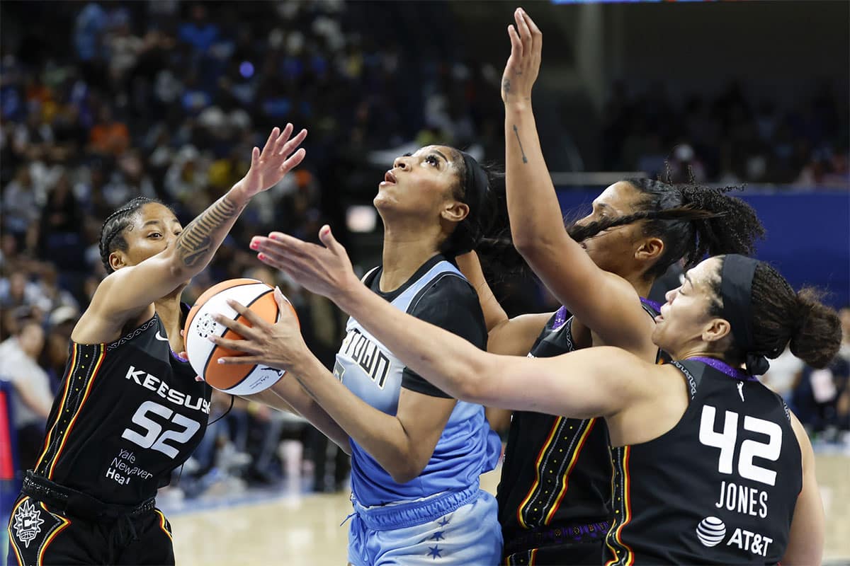 Chicago Sky forward Angel Reese (5) goes to the basket against the Connecticut Sun during the second half of a WNBA game at Wintrust Arena.