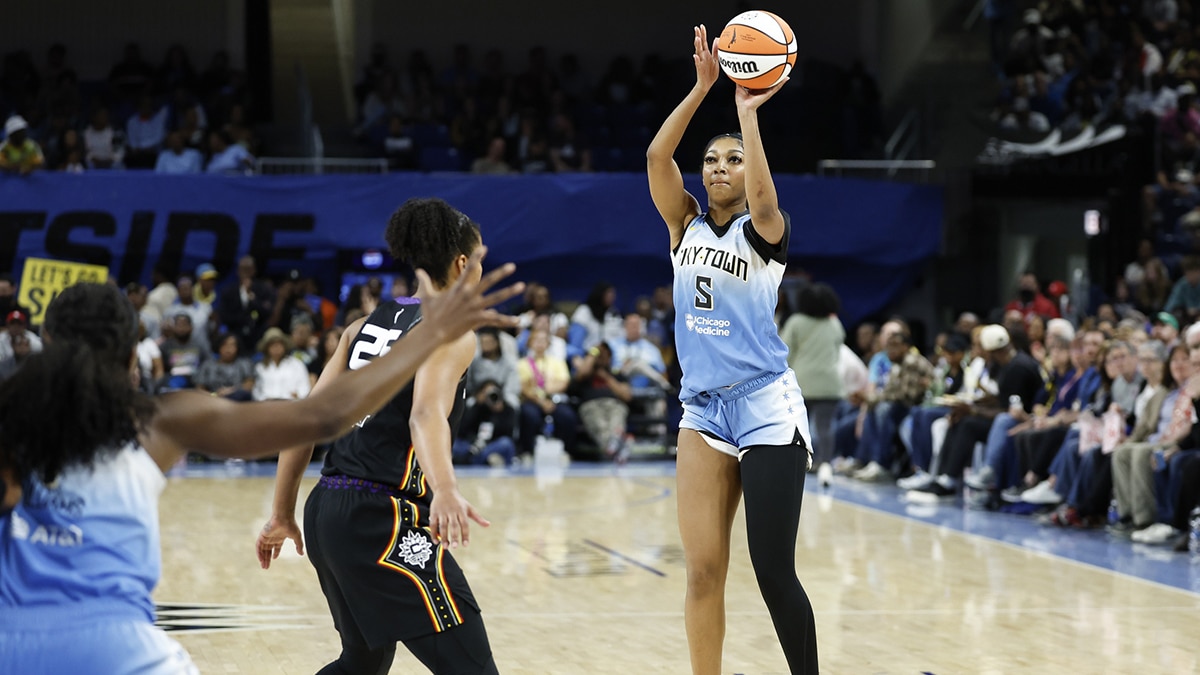 May 25, 2024; Chicago, Illinois, USA; Chicago Sky forward Angel Reese (5) shoots against the Connecticut Sun during the second half of a WNBA game at Wintrust Arena. Mandatory Credit: Kamil Krzaczynski-USA TODAY Sports