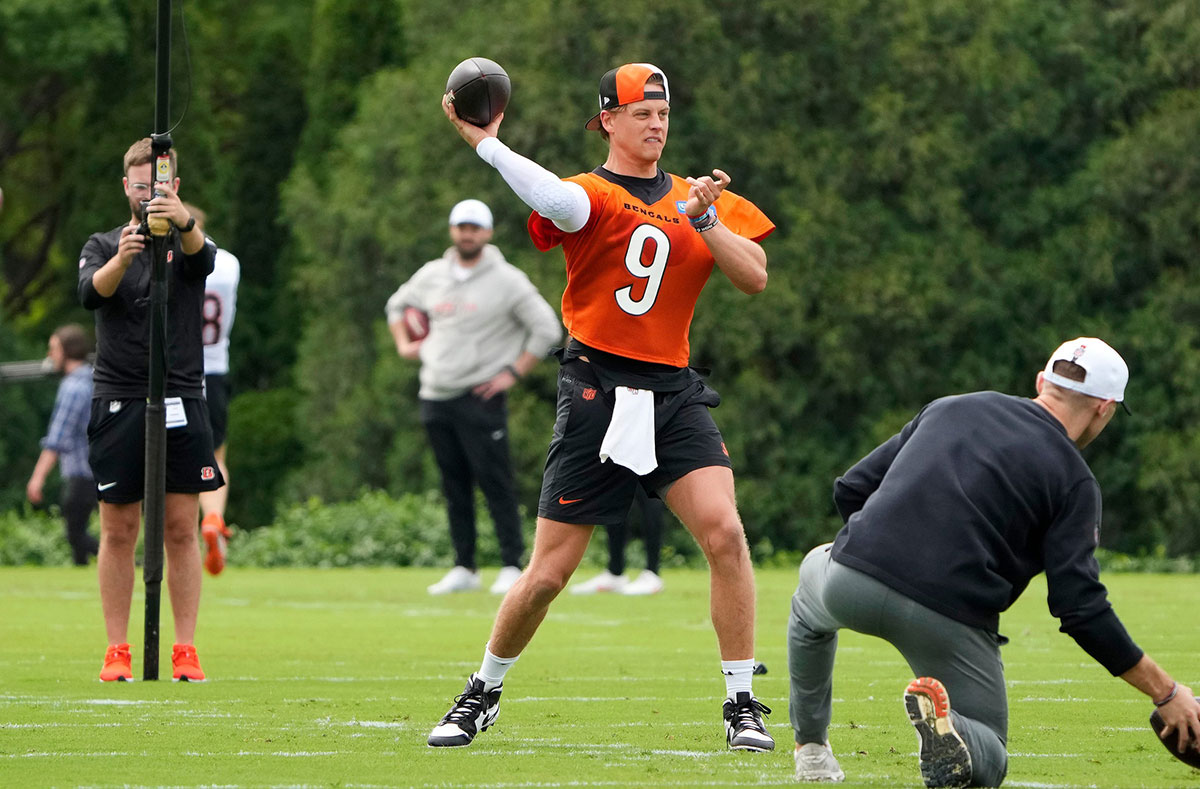 Cincinnati Bengals quarterback Joe Burrow returns to the practice field during an offseason workout at the practice fields outside of Paycor Stadium Tuesday, May 7, 2024