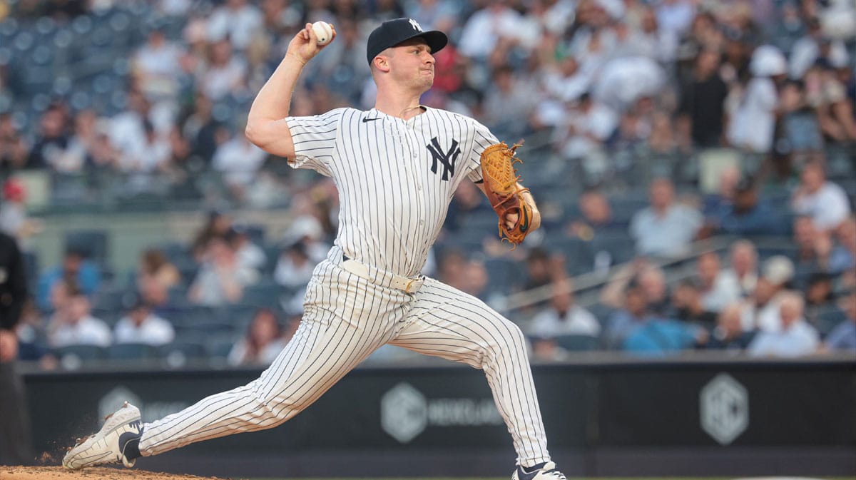 New York Yankees starting pitcher Clarke Schmidt (36) delivers a pitch during the third inning against the Seattle Mariners at Yankee Stadium.