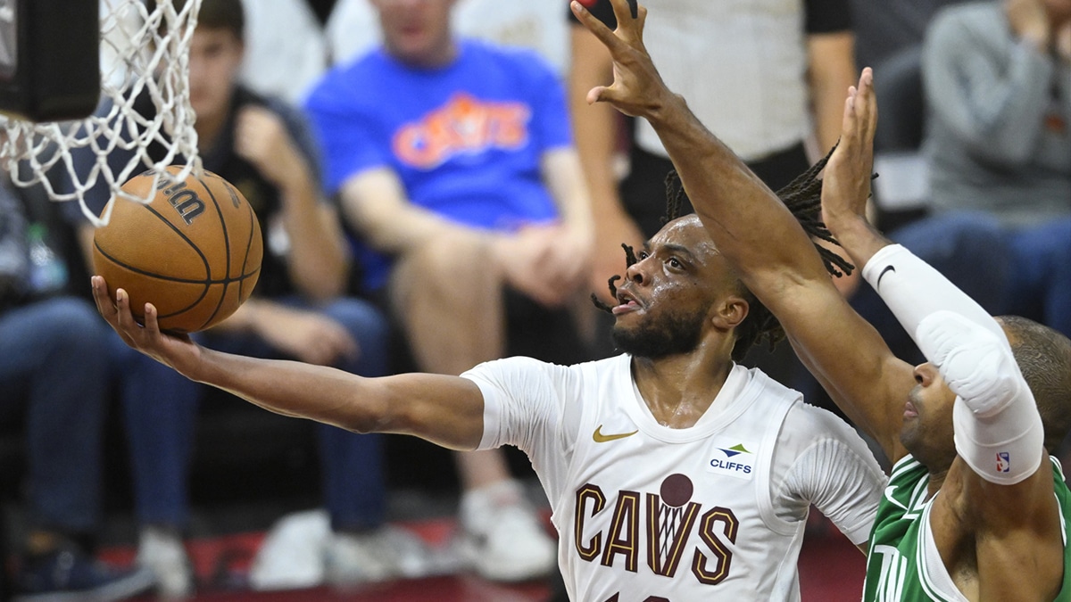 May 13, 2024; Cleveland, Ohio, USA; Cleveland Cavaliers guard Darius Garland (10) drives against Boston Celtics center Al Horford (42) in the fourth quarter of game four of the second round for the 2024 NBA playoffs at Rocket Mortgage FieldHouse. Mandatory Credit: David Richard-USA TODAY Sports