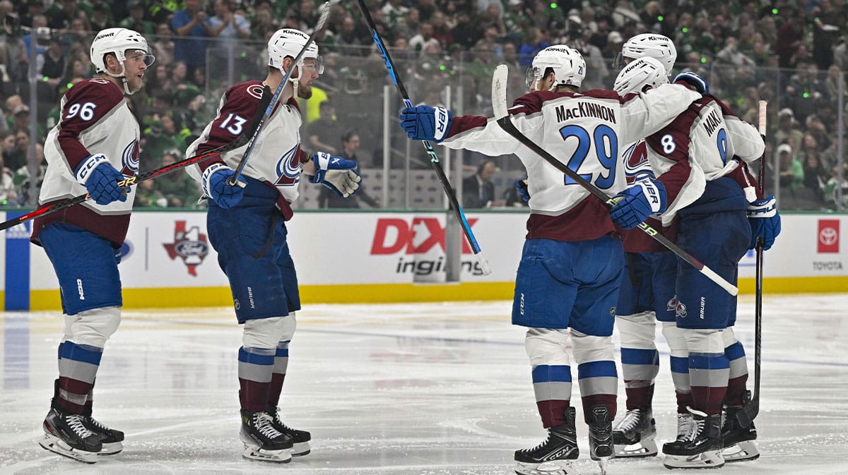Colorado Avalanche right wing Mikko Rantanen (96) and right wing Valeri Nichushkin (13) and center Nathan MacKinnon (29) and defenseman Cale Makar (8) celebrates the game tying goal scored by MacKinnon against the Dallas Stars during the third period in game one of the second round of the 2024 Stanley Cup Playoffs at American Airlines Center.
