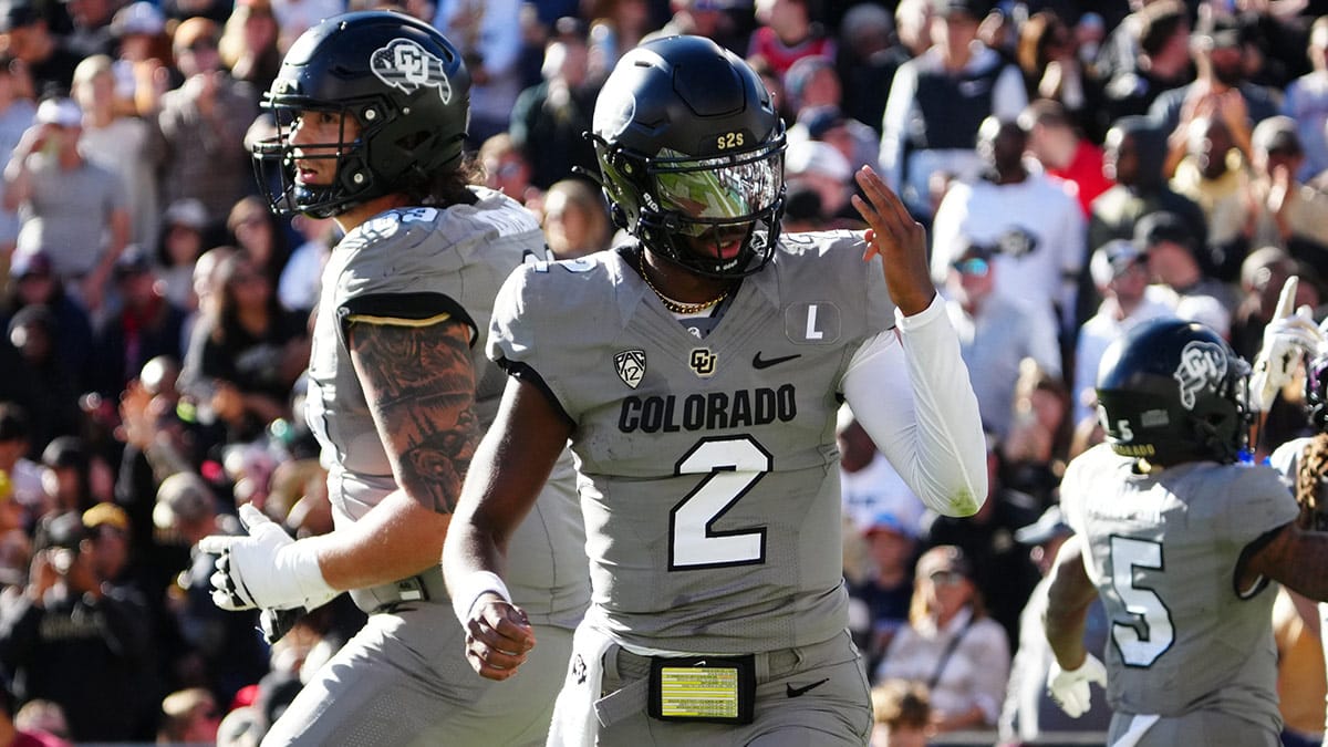 Colorado Buffaloes quarterback Shedeur Sanders (2) celebrates after a touchdown against the Arizona Wildcats in the second quarter at Folsom Field. 
