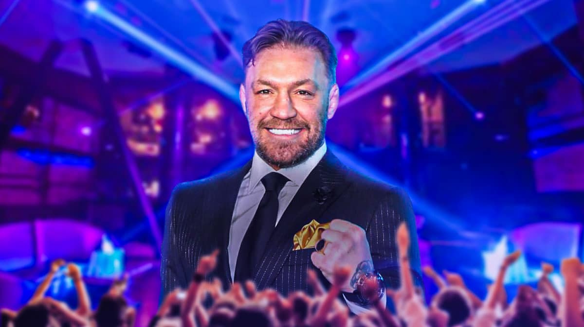 Conor McGregor laughing/smiling in a club