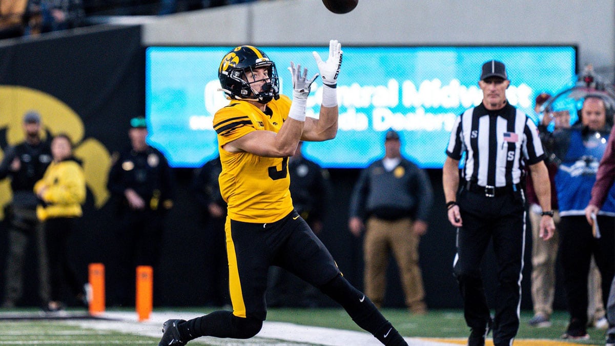 Iowa defensive back Cooper DeJean (3) catches a punt at Kinnick Stadium on Saturday, October 21, 2023 in Iowa City. DeJean returned the punt for a touchdown and it was later called back after review ruled he fair-caught the punt.