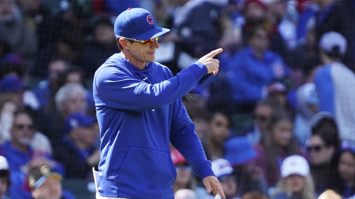 Chicago Cubs manager Craig Counsell (30) makes a pitching change against the Miami Marlins during the seventh inning at Wrigley Field.