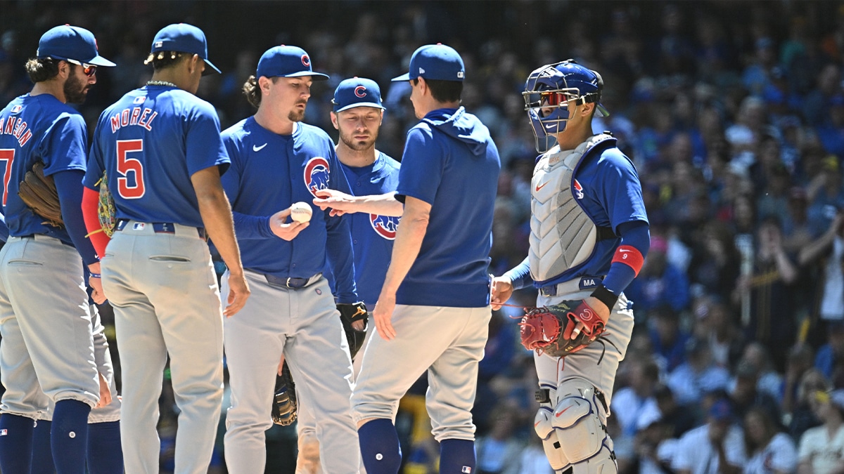 Chicago Cubs relief pitcher Mark Leiter Jr. (38) visits the mound to relieve relief pitcher Hayden Wesneski (19) in the seventh inning at American Family Field.
