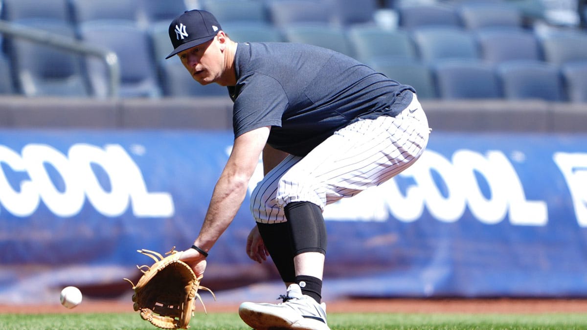 New York Yankees third baseman DJ LeMahieu (26) takes infield practice before a game against the Oakland Athletics at Yankee Stadium.