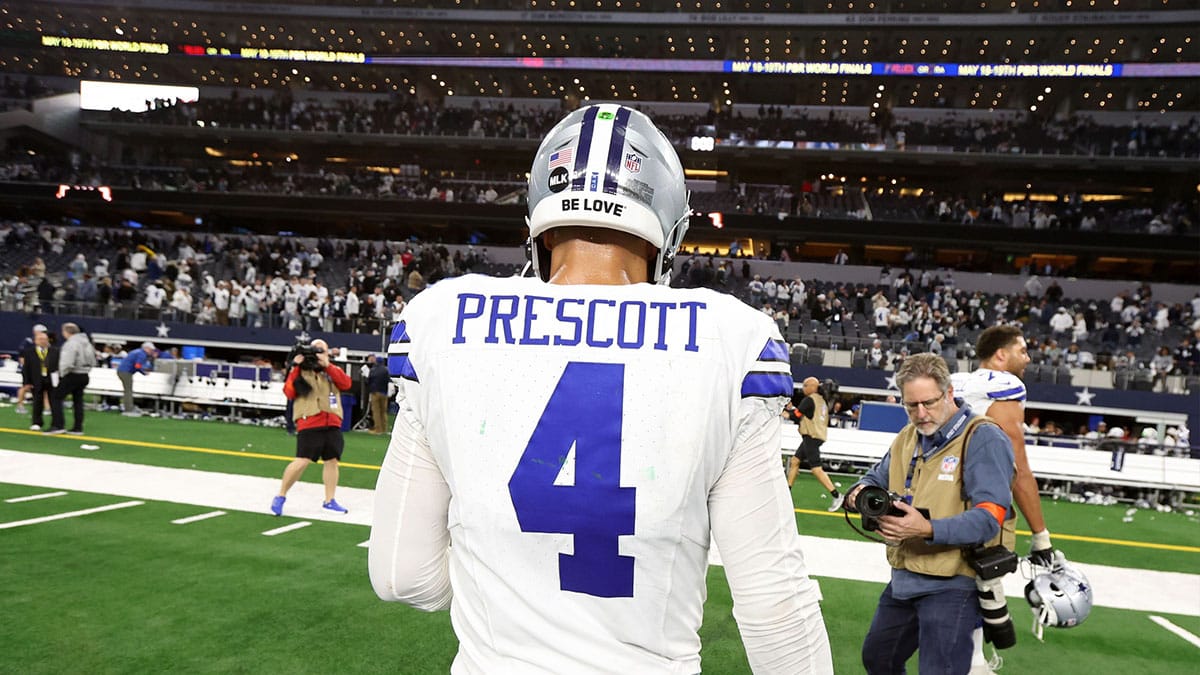 Dallas Cowboys quarterback Dak Prescott (4) walks off the field after losing in the 2024 NFC wild card game against the Green Bay Packers at AT&T Stadium.